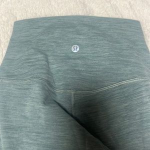 Size 4 green Lululemon leggings barley worn